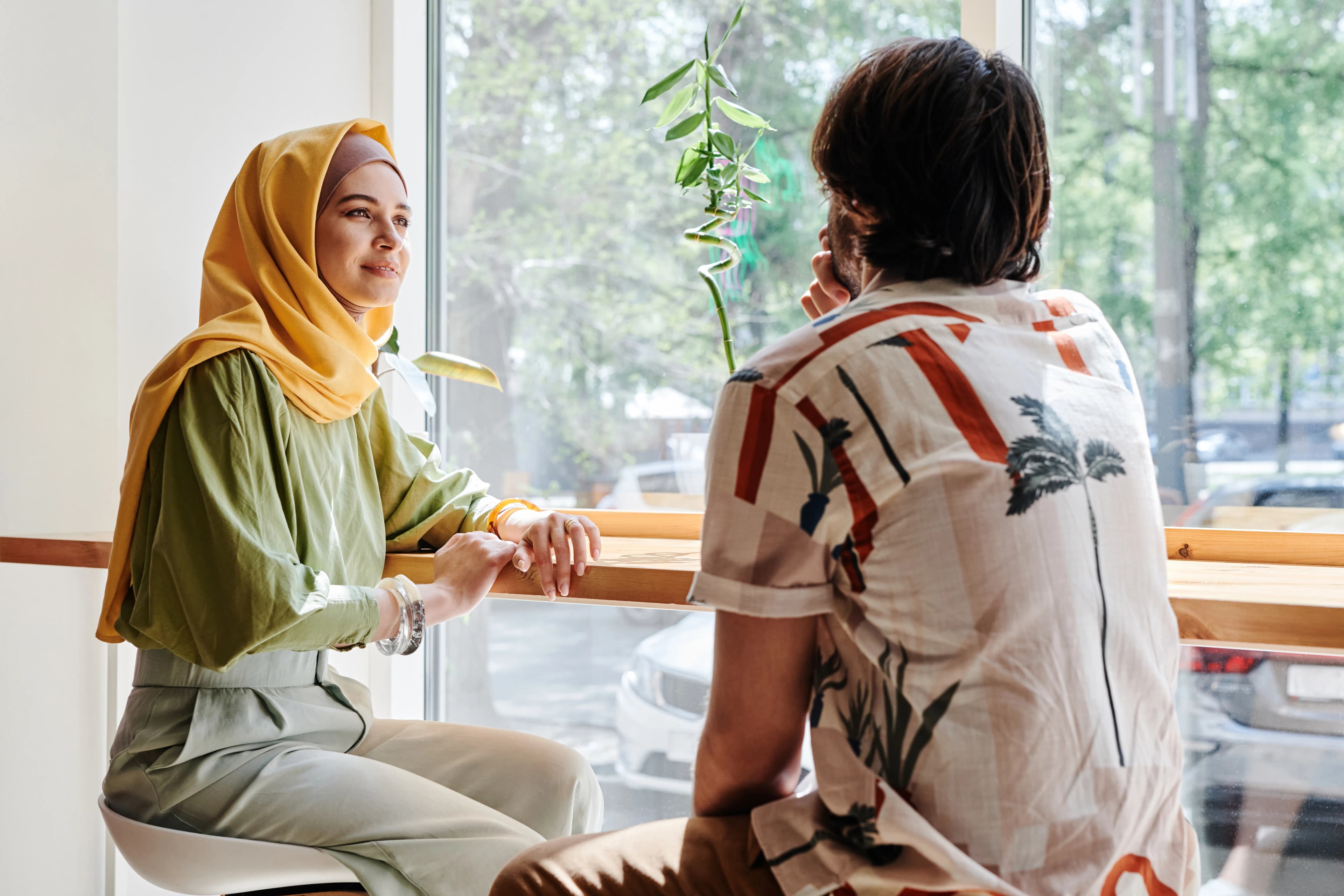Couple having an open conversation over coffee at a cafe