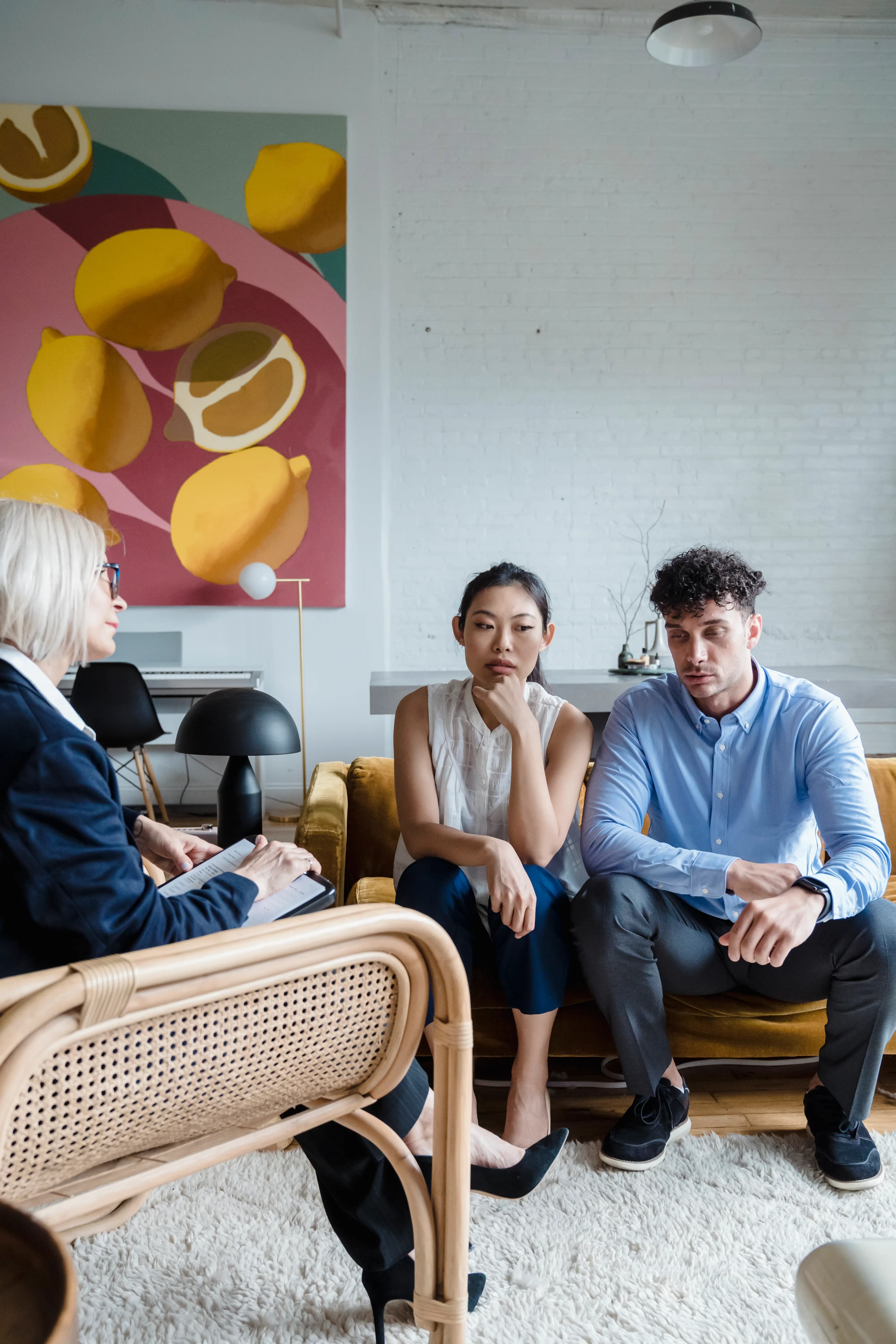 A couple talking with a relationship counsellor